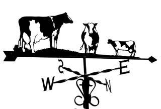 Three Friesian cows weathervane